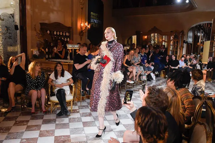 Game of Thrones star, Christie, walks the runway in leopard print for Miu Miu.

Photo: Getty