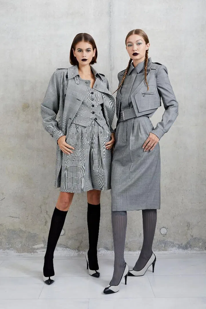 Kaia Gerber and Gigi Hadid playing modern spy heroines in cool grey tailoring.

Photo: Courtesy