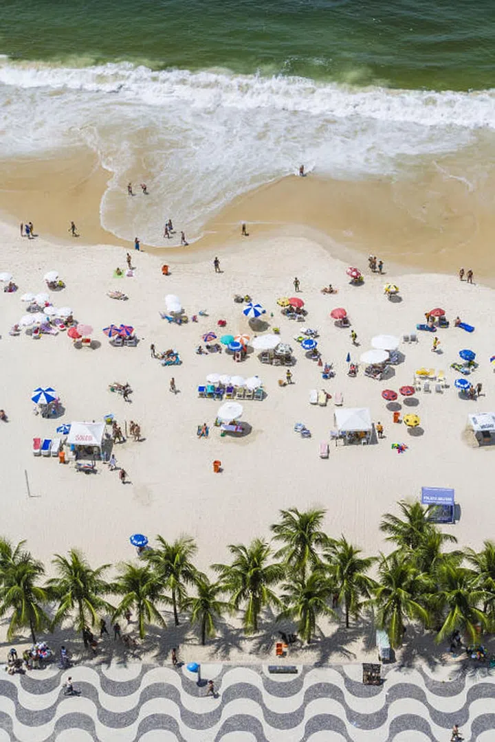 Book a room at the Copacabana Palace Hotel for stunning views of the iconic Portuguese pavement sidewalks and exclusive access to a section of the beach with lounge chairs and umbrella service.