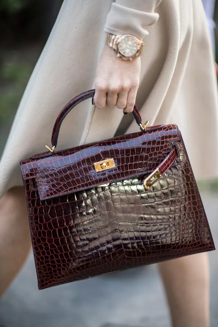 It's said that Grace Kelly used this vintage bag style to conceal the early signs of pregnancy - the brand consequently renamed it after her. Photo: Getty 