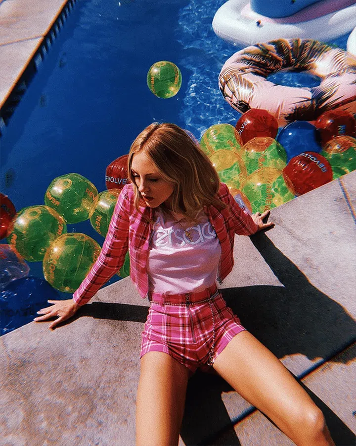 Logo tees are here to stay and the one to have right now is all about vintage Versace. Wear it with a shorts suit like Shea Marie.

Shop it: Versace t-shirt, $350, mytheresa.com.