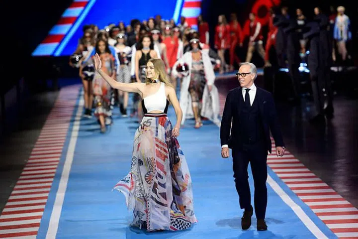 Gigi Hadid and Tommy Hilfiger at their final collaborative show together in Milan.

Photo: Getty