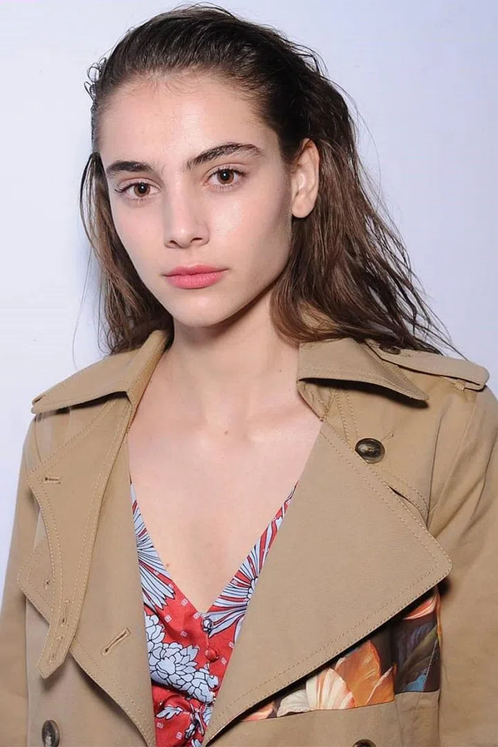 Though the weather in New York City the night of the Thakoon presentation was far from ideal—a blizzard had just passed through—hairstylist Odile Gilbert served-up a hair look that was tailor-made for crappy weather days. Inspired by the trench coats in the collection, Gilbert soaked the roots of models' hair with a mix of mousse (TRESemmé 24 Hour Body Amplifying Mousse) and creams to give the illusion of wet hair, but with far more control