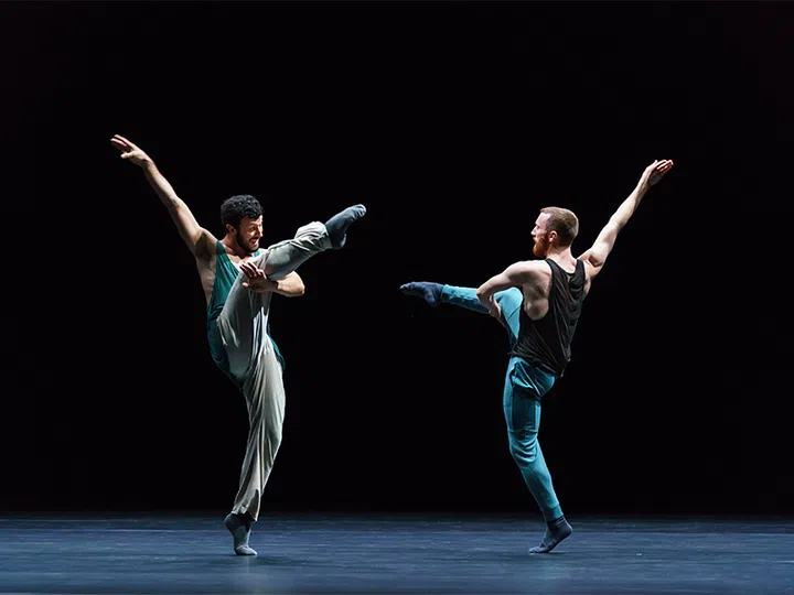 two ballerinas performing a routine dance reflections
