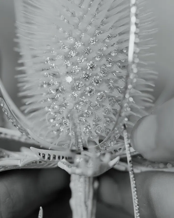 Details from the thistle of Composition No. 5 with the diamonds sewn in onto the flower head.