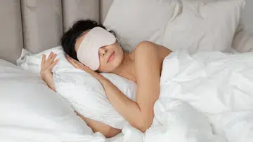 woman sleeping with eye mask