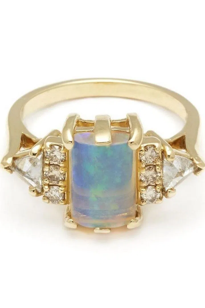 "Bea" ring with opal, champagne diamond trillions and 14kt gold, $5,500, annasheffield.com.
