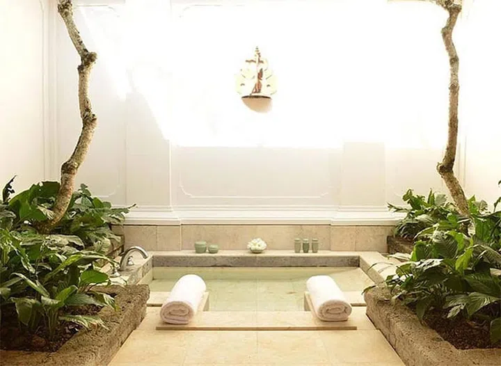 Aman derives from a word that means “place of peace,” and the trademark tranquility of the brand’s resorts (across 20 countries) is exactly what attracts its cult-like fan base (self-named Amanjunkies). The properties are known for minimalist design schemes that blend into show-stopping natural surroundings—accented by superior personalized service and a dreamy pool, of course. Amandari’s spa incorporates scents and materials indigenous to the island to create a five-senses experience. Its signature Village Spa Treatment, also based on the Balinese melukat, follows up a water purification ritual with tactile treatments including a full-body black rice exfoliation, a volcanic clay body wrap, and a massage. Other standouts include the frangipani-filled flower bath and the mandi lulur, a wedding day ceremony built around a massage, a turmeric-and-honey exfoliating body mask, and an aromatic herbal bath.