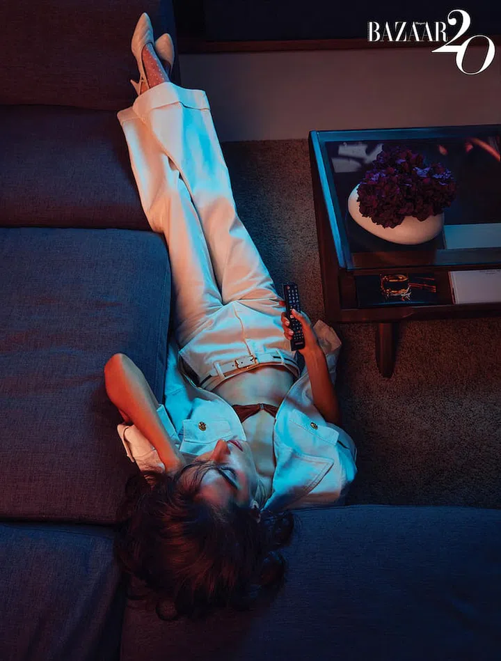 Cotton jacket; cotton trousers; leather belt; leather slingback heels, all from Gucci. Silk bra; mesh socks (worn throughout), stylist’s own. (Photo: Gan)