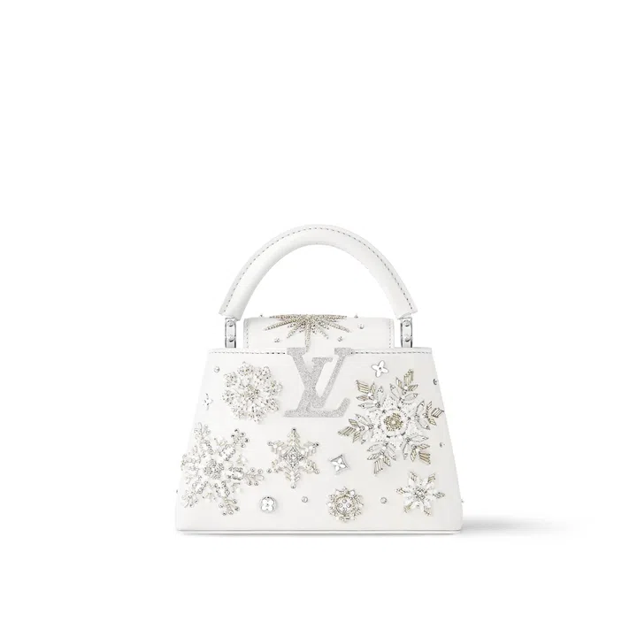 Louis Vuitton Capucines white bag snowflake embellishment crystal gift guide Christmas 2024