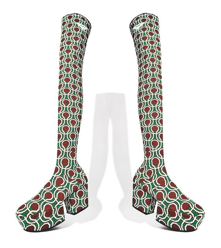 Miuccia Prada And Raf Simons Scale Great Heights With The Boots Of The Season