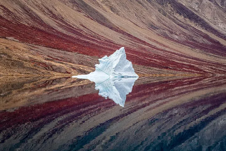 McGowan captures a solitary iceberg, set against the fjord walls in Northeast Greenland National Park.