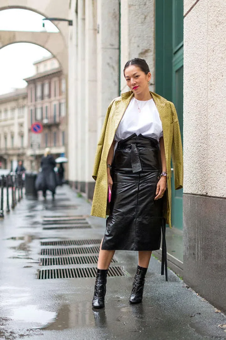Need to add a little edge to your look? Ankle boots do the trick when paired with jeans or dresses. Seen on Tina Leung.  Photo: Diego Zuko
