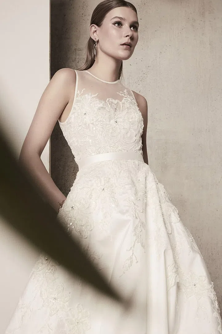 High necklines and full skirts paired with effortless beauty looks feel anything but stuffy in the country. Elie Saab gown, eliesaab.com. 