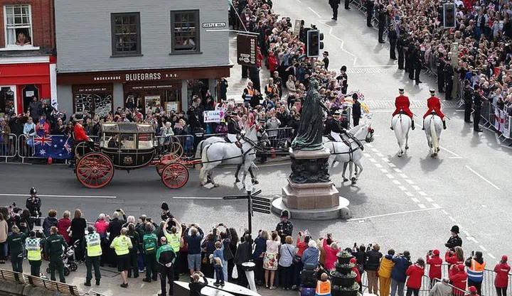 The streets were lined with people waiting to catch a glimpse of the princess bride.