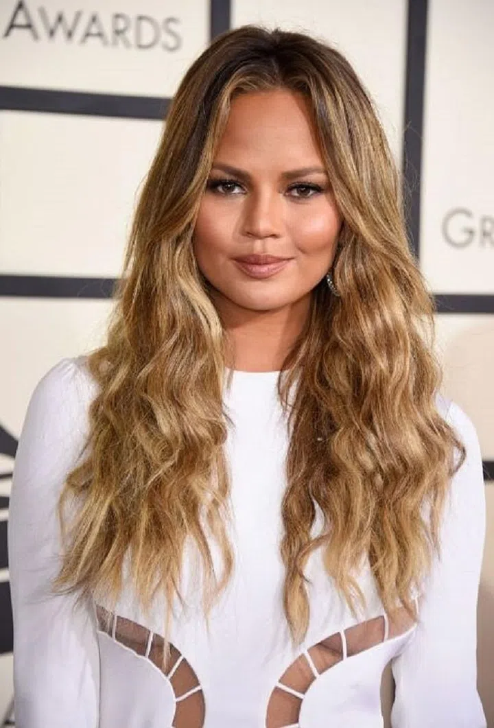 "I always tell brides to avoid hairspray. You can often see it and feel  in the hair, and no bride wants that on their big day," says Fugate. Photo: Getty