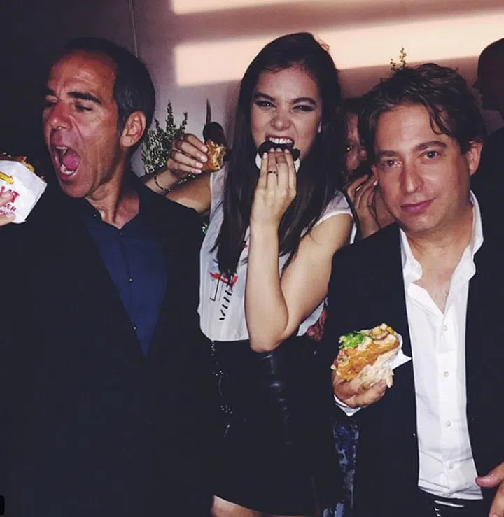 Double fisting a burger and an ice cream sandwich? This girl knows how to have a good time.
Photo: Instagram