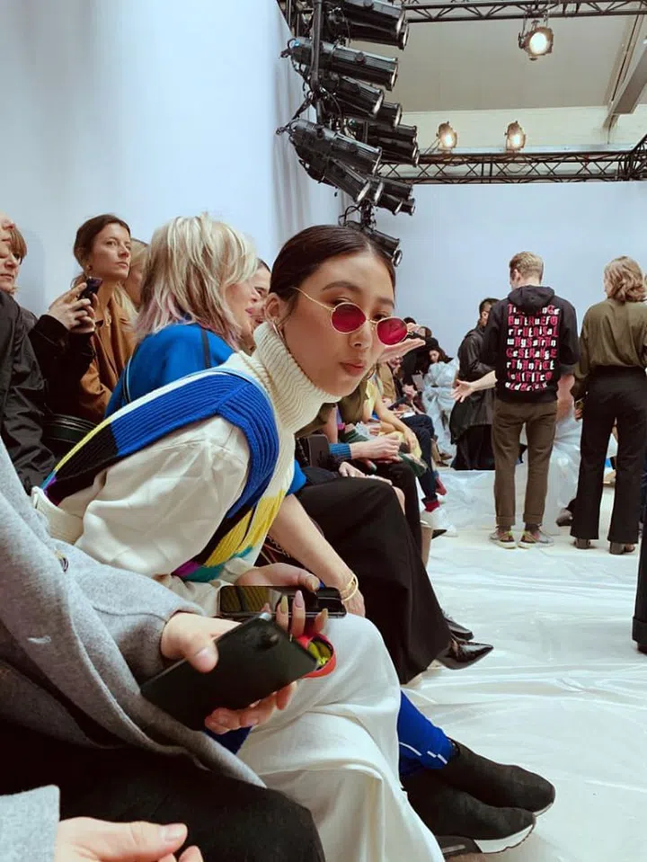 Style star Mae Tan spotted at the FROW at JW Anderson. 