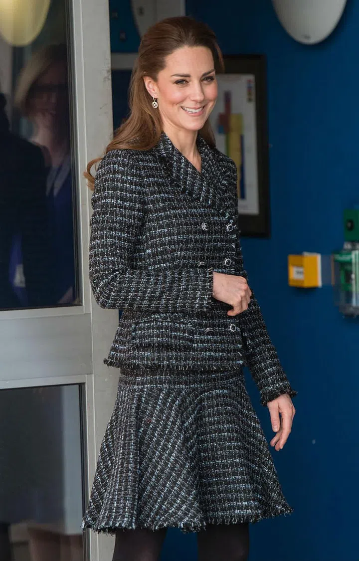 The royal visited the Evelina London Children’s Hospital to attend a workshop run by the National Portrait Gallery's Hospital Programme. Kate wore a chic tweed skirt suit by Dolce & Gabbana paired with black tights and pumps.