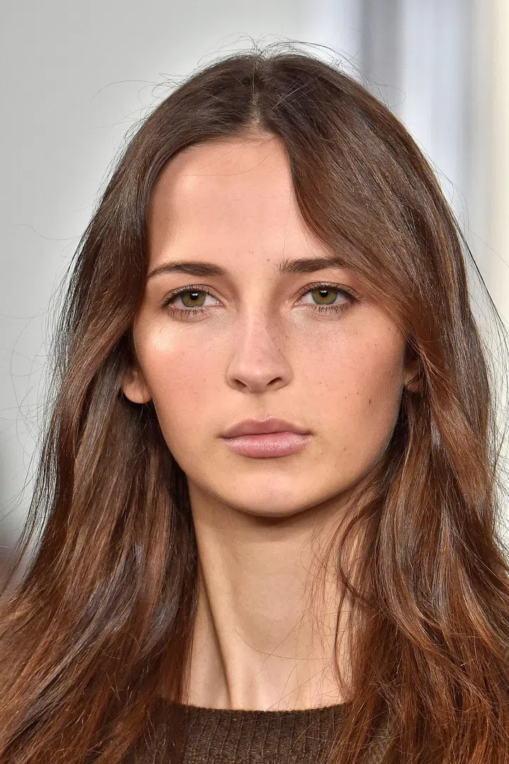 Highlighter was king backstage at Ralph Lauren for autumn/winter 16 and was used to add light and definition. The rest of the hair and make-up was pared-back and elegant.