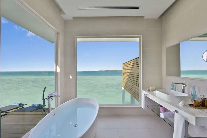 In the Aqua Villas at the newly-opened Kandima resort in the Maldives, guests can have a bath while looking out over the Indian Ocean. Guests regularly spot dolphins playing in the sea from the bath too - something quite different from the mouldy bath in your overpriced rented flat at home.