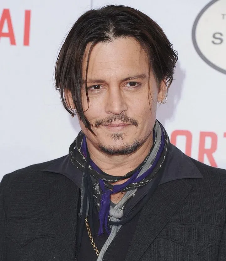 So cute! Johnny Depp took time out of filming the newest Pirates of the Caribbean film to stop by Lady Cliento Children's Hospital in Brisbane, Australia (in full Jack Sparrow costuming, no less) to cheer up some kiddos and pose for pictures. In fact, he wanted to spend so much time with them that he reportedly visited on the condition that he wouldn't be rushed along, and could spend as much time as he wanted at the hospital. A+ Johnny.
