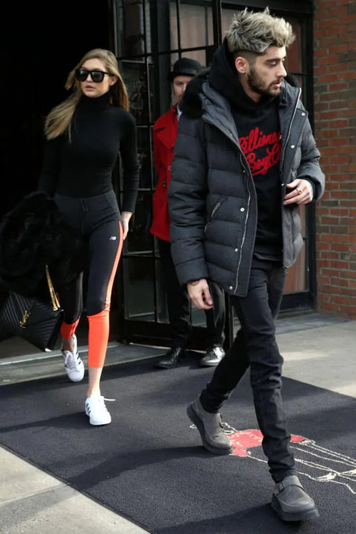 When they rocked all-black wintry athleticwear with touches of red.