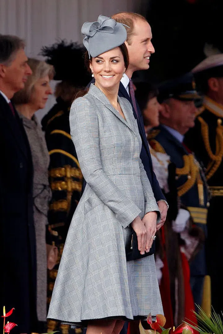 The Duchess is so chic she can make plaid a neutral.