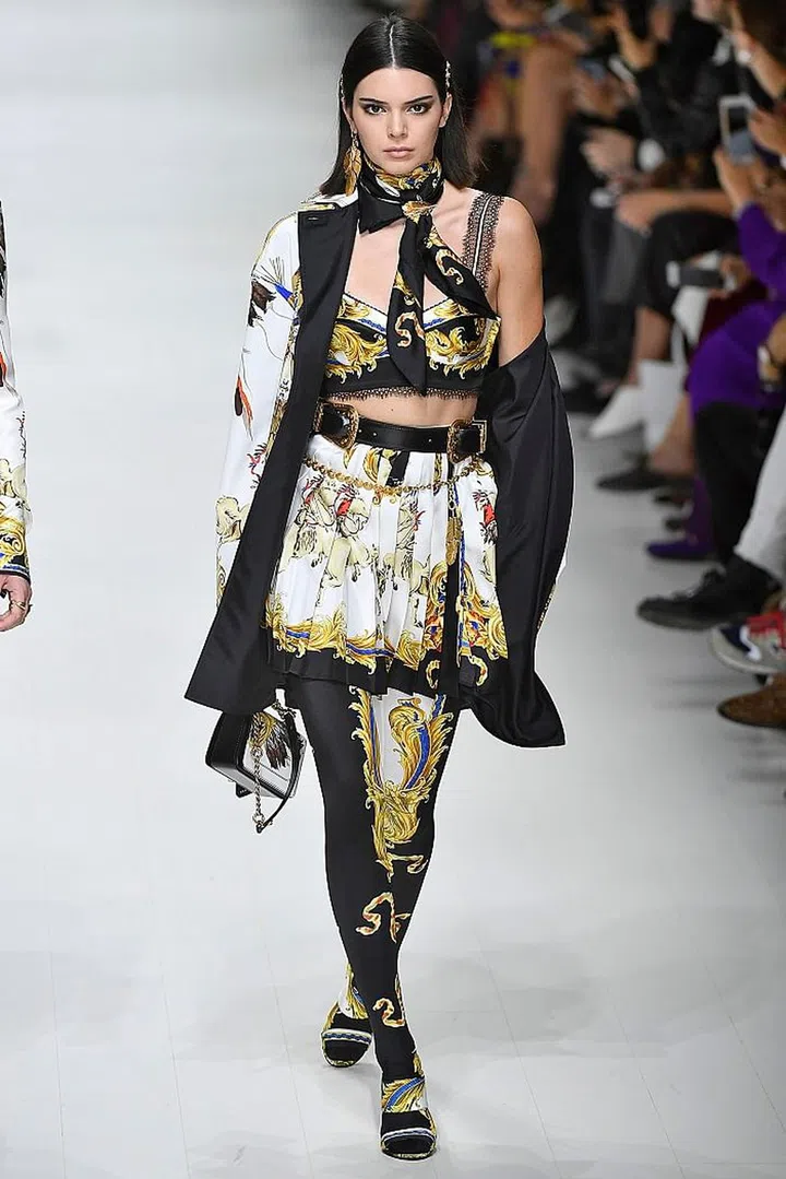 MILAN, ITALY - SEPTEMBER 22: Kendall Jenner walks the runway at the Versace Ready to Wear Spring/Summer 2018 fashion show during Milan Fashion Week Spring/Summer 2018 on September 22, 2017 in Milan, Italy. (Photo by Victor VIRGILE/Gamma-Rapho via Getty Images)