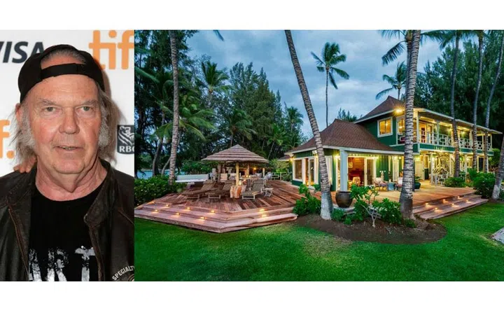 Canadian singer/songwriter Neil Young spent many a summer at this beautiful Hawaiian property that dates back to the 1920s. Along with a gorgeous five-bedroom main house, the property includes two guest cottages, two greenhouses and a swimming pool. He recently sold the property for $20 million, according to Zillow. Photo: Getty/ Zillow.
