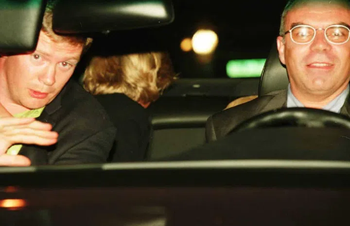A photo taken by Jacques Langevin on the night of August 31, 1997 shows Diana Princess of Wales (head turned away in backseat), her bodyguard Trevor Rees-Jones (L) and driver Henri Paul shortly before the fatal crash