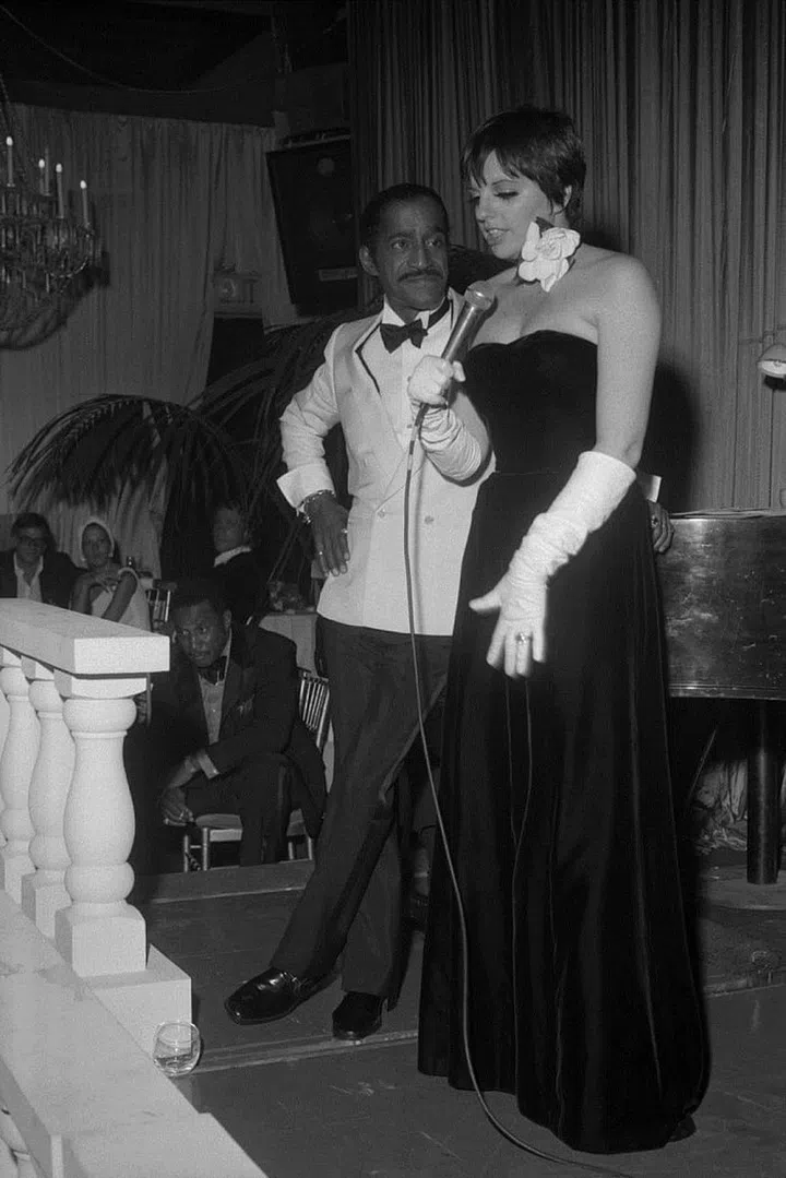 Marrying Jack Haley Jr. in 1986. Fashioning a flower choker as we speak. 