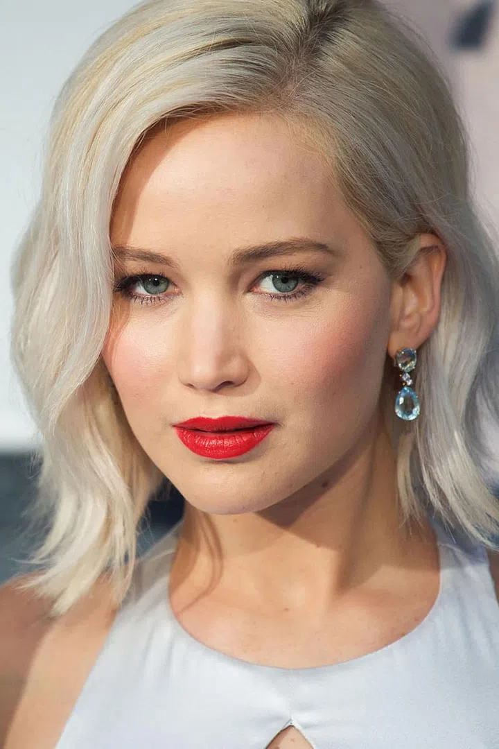 Cherry-red looked striking against Lawrence's white-blonde hair.
