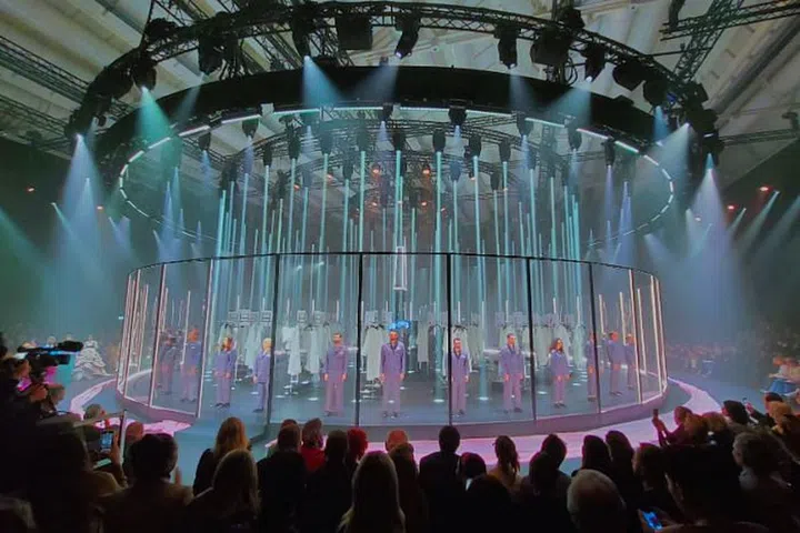 Gucci’s rotating glass carousel brought the backstage upfront as centrestage.
