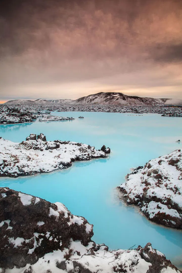 Located southwest of Reykjavik, Iceland's famous Blue Lagoon gets its trademark color from the silica-rich waters that feed it. And it isn't just pretty—the geothermal water is great for your skin too.