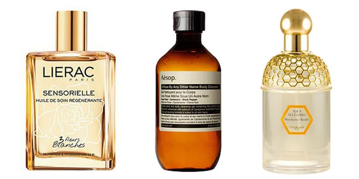 From Left: Lierac Sensorielle Regenerating Body Oil, Aesop A Rose By Any Other Name Body Cleanser, Guerlain Mandarine Basilic