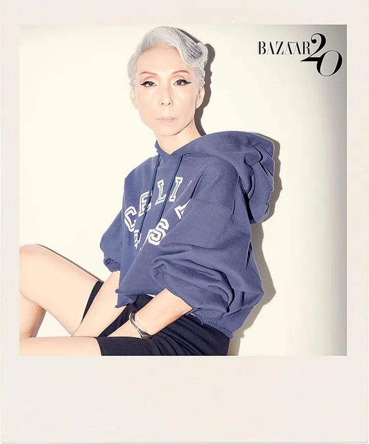 Hoodie; bike shorts, both CELINE by Hedi Slimane. Cuff, by Tiffany & Co. (Photo: Gan)