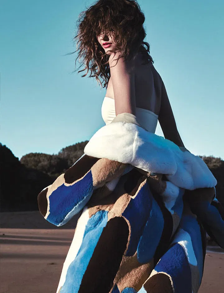 Fur coat. Lycra strapless swimsuit, Eres