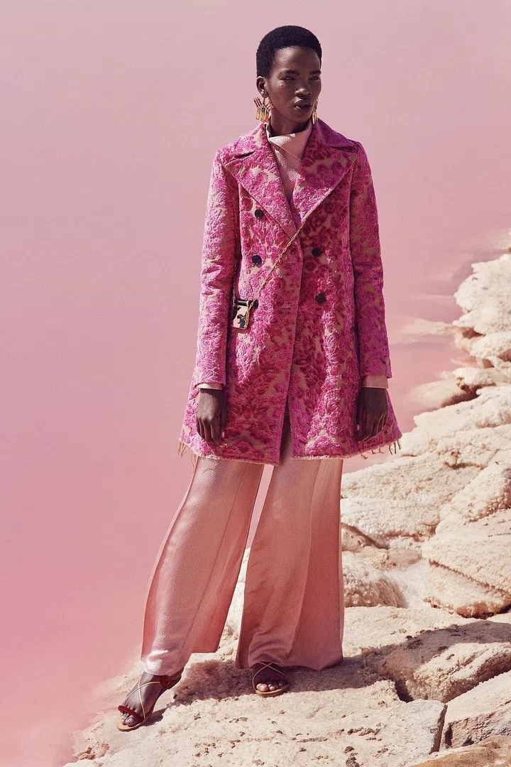 Coat, pants, Valentino; sandals, earrings, Valentino Garavani