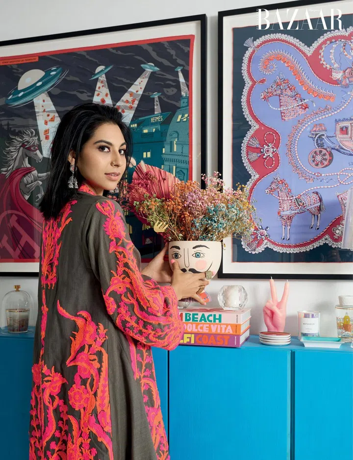 Kausar in a Sana Safinaz coat worn with denim jeans and Electric Bazaar earrings. 