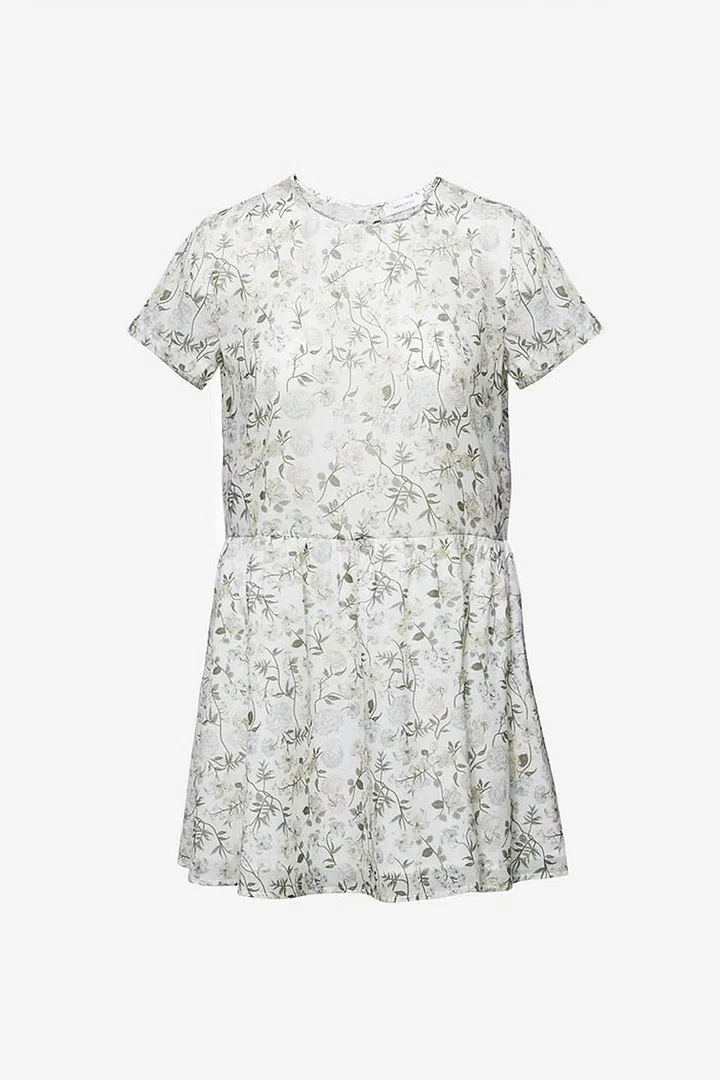 Work Anine Bing's sweet floral dress with a pair of boots for an LA model look.