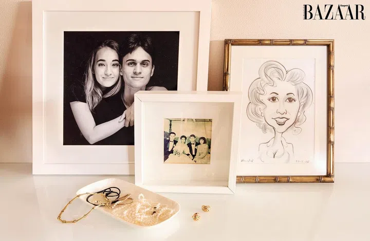 A family portrait and photo of her daughter and son.