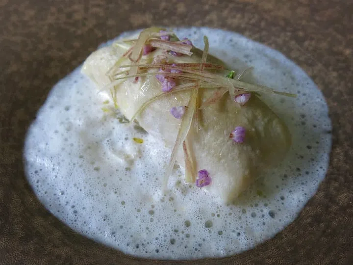 Steamed kinme snapper fish plated with juicy foie gras served with ginger-scented fish soup. Photo: Lewin Terrace