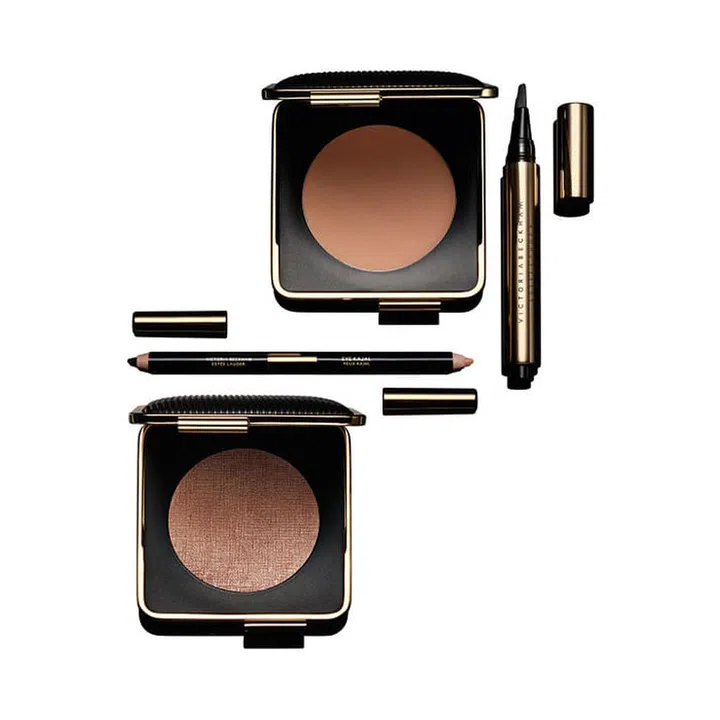 LOS ANGELES
Clockwise from top center:
Victoria Beckham Estée Lauder Bronzer in Java Sun ($65) An entirely matte bronzer—read: no twinkle—in a versatile tawny brown.
Victoria Beckham Estée Lauder Lip Gloss in Moroccan Heat ($36) VB is the reigning queen of warm nude lips. This one smells like fig (all Lauder glosses do) and lends high-gloss sheen when worn over your favorite nude matte.
Victoria Beckham Estée Lauder Eye Kajal Duo in Black Saffron/Vanille ($30) One end is sooty black; the other is a creamy nude. Pick your poison.
Victoria Beckham Estée Lauder Highlighter in Modern Mercury ($65) A few years back, Estée Lauder released this rose gold highlighter before in another limited-edition collection and Beckham fell in love. So they included it here, too. She likes how it gives you that sexy, sweaty skin look. Photo: Estée Lauder