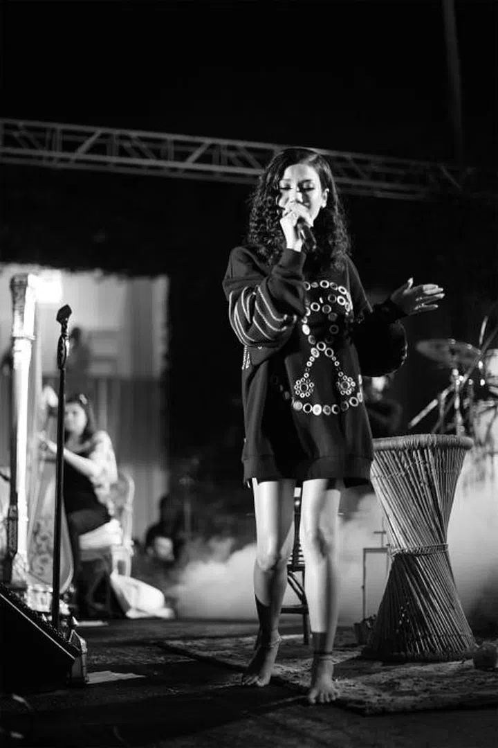 "Intimate shows with my band are my favorite because I can really connect with the audience and get comfortable on stage. We just kept going, even when it started to rain!"