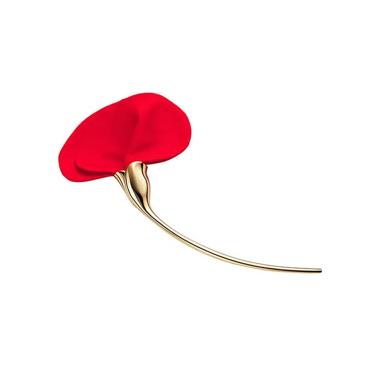 Made from silk, this iconic brooch was inspired by Japan, where the petals are woven on the same looms that have supplied the flamboyant Noh theatre costumes for centuries.