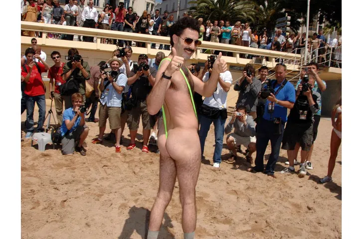 Remember when Borat wore a banana hammock swimmie on the beach? Ugh. Us too. Photo: Getty