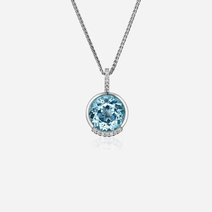Poh Heng Peace Around Topaz Pendant, $1,200