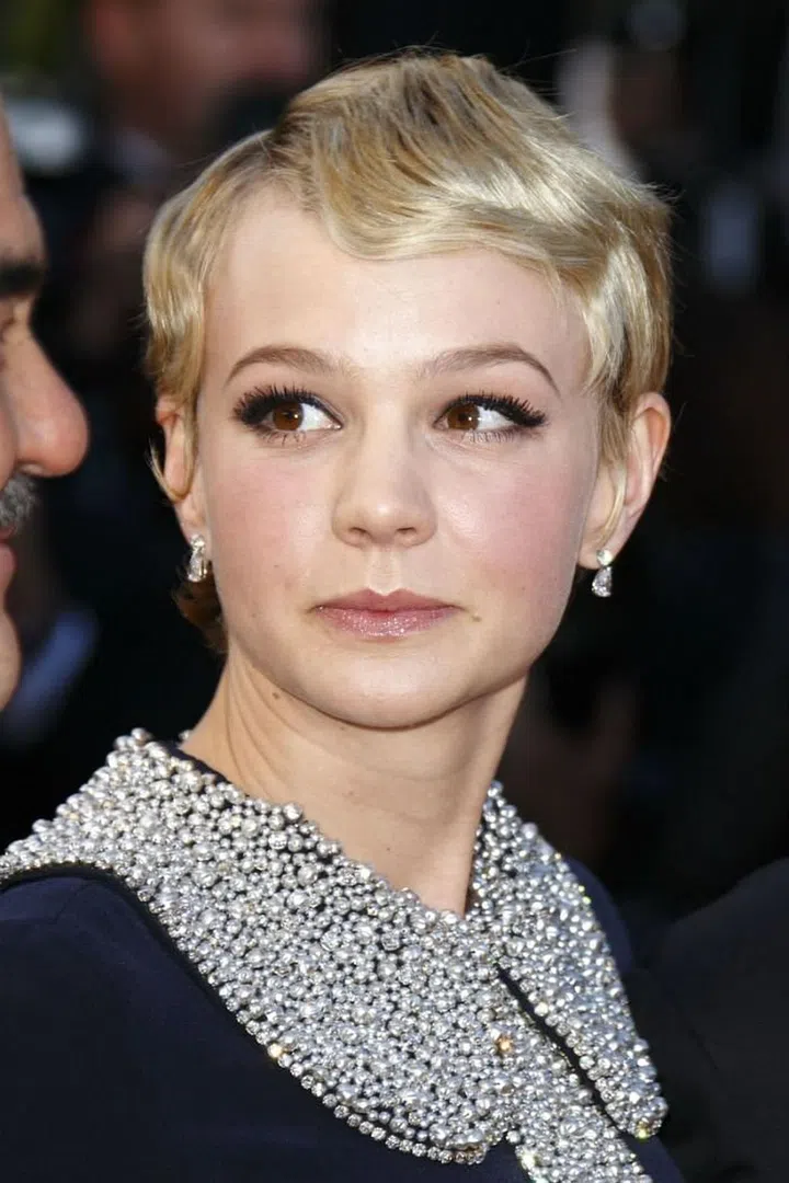 The cut that launched a thousand copycats (and this infamous scene from Girls) is immaculately crimped here in a '20s style that's fitting for Miss Daisy Buchanan. Photo: Getty