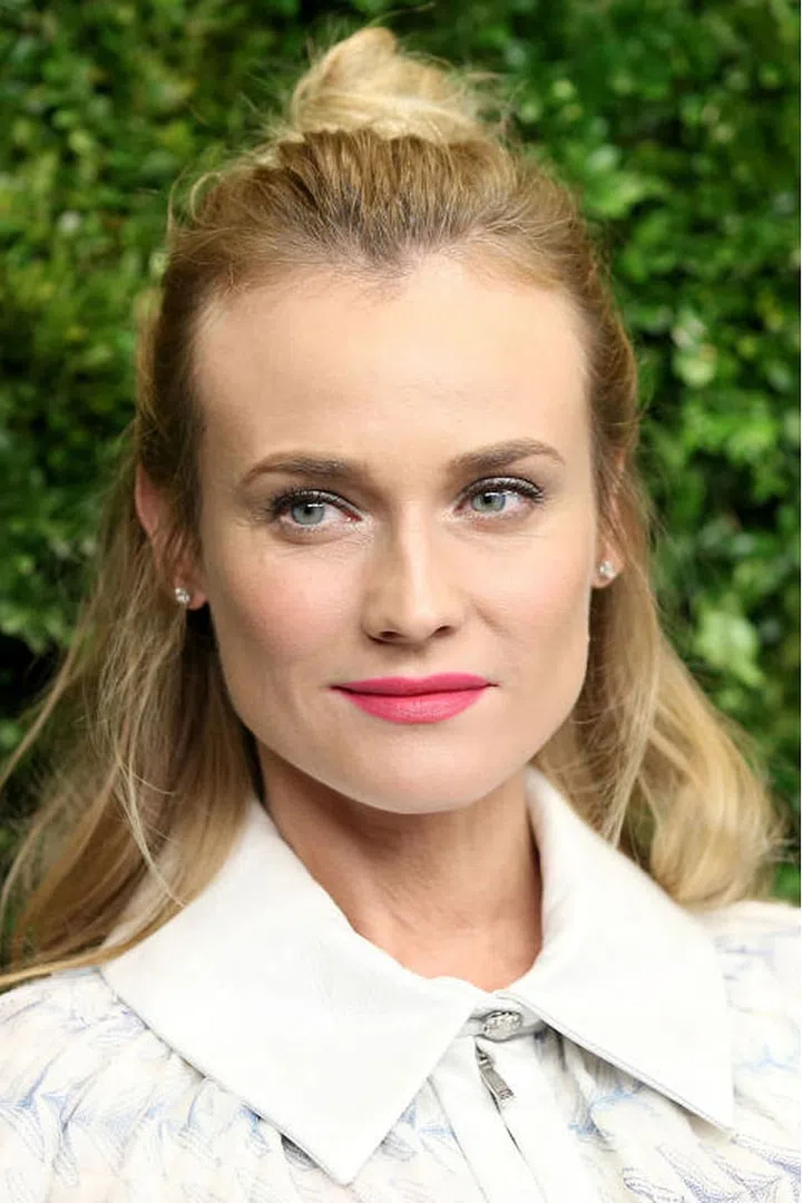 A half-up top knot feels slightly more romantic.
Photo: Getty